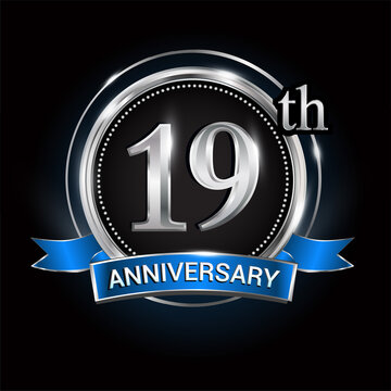 Celebrating 19th Anniversary Logo. With Silver Ring And Blue Ribbon.