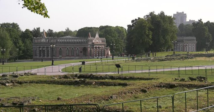 4K high quality sunny spring day video footage of famous Moscow Tsaritsyno Estate built during rein of Czarina Katherine 2 The Great with visitors and panorama of green park in the capital of Russia