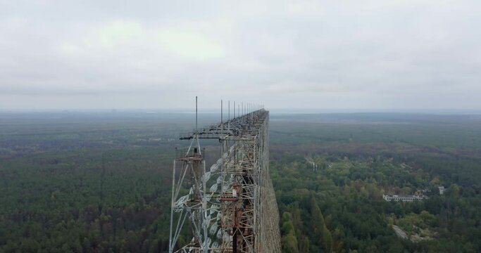Enormous Duga Radar Antenna In The Forest Near Chernobyl In Pripyat, Ukraine - orbiting drone shot