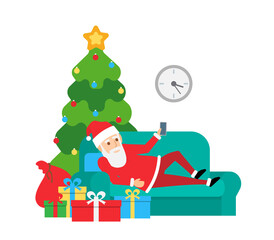santa claus lying on the sofa and using smartphone.merry christmas 