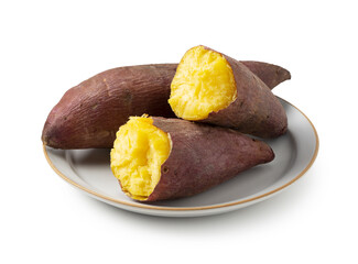 A sweet potato split in half on a white background