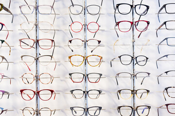 Image of spectacles on shelf at the optical store, nobody