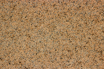 texture of a granite tile for decoration of facade 