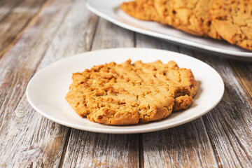 A view of a peanut butter cookie on a saucer.