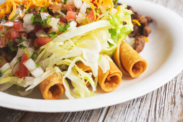 A view of a taquitos plate.