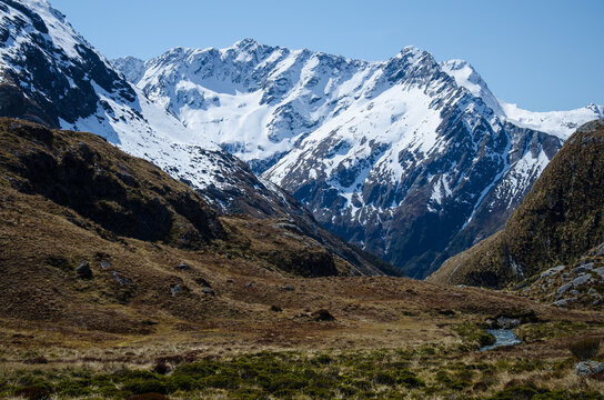 Closeup shot of snowy mountains from the Routeburn Track, New Zealand