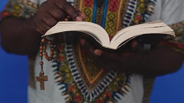 Memorizing holy bible book with a jesus cross