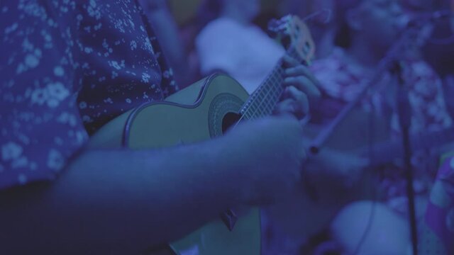 Playing Guitar during a roda de samba