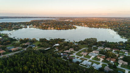 "Clermont, FL / USA - 11-4-2020: Aerial view of the south side of Crescent lake of the Clermont Chain of Lakes." © Noah Densmore