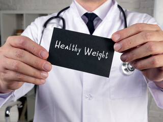 Health care concept meaning Healthy Weight  with inscription on the sheet.