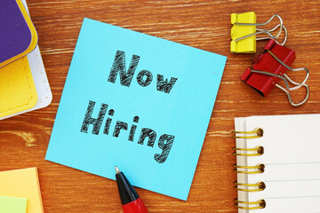 Conceptual photo about Now Hiring with handwritten phrase.