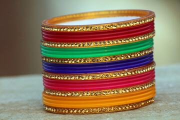 multi color bangle put on a stone