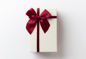 Gift box mockup on the white table with copy space. Merry christmas and happy new years background.