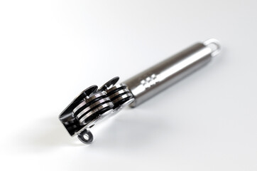 metal kitchen appliance for manual knife sharpening close up sharpness in the foreground