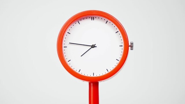 Minimal red clock isolated on white background, Time lapse 150 minutes.