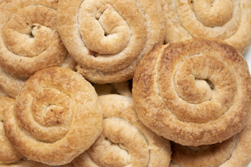 Sweet cinnamon rolls on table