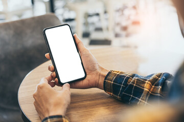 cell phone blank white screen mockup.woman hand holding texting using mobile on desk at office.background empty space for advertise.work people contact marketing business,technology