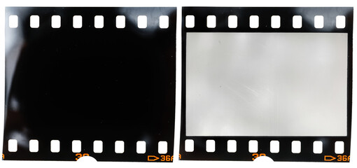 real 35mm film strip on white with and without blank picture frame, macro photo of old and vintage...