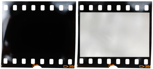 real 35mm film strip on white with and without blank picture frame, macro photo of old and vintage...