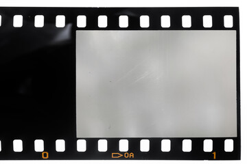 long 35mm film strip or negative on white, first blank and empty frame of the role, place your photo content here, dia positive material