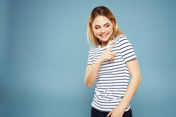 Pretty woman striped t-shirt fun emotions lifestyle blue background