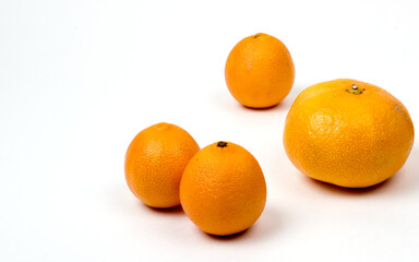 Tangerines on a white background, close-up, copy space, isolated