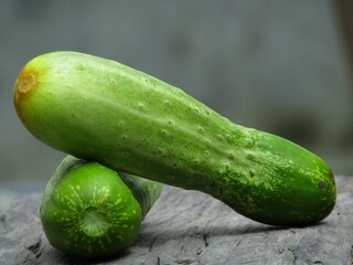cucumbers on a board