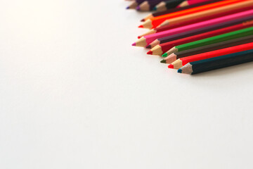 Color pencils isolated on white background, close up, use for presentation background or graphic resource 