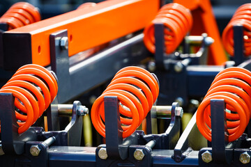 Industrial spring at agricultural machine