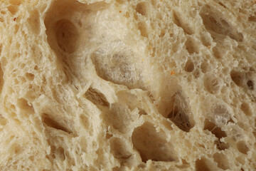 Fresh baked bread on whole background, close up