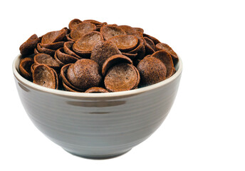 chocolate shells in a bowl on a white background