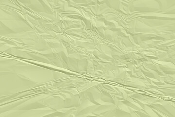 crumpled green paper background close up