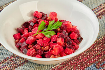 Vinegret or vinaigrette, red beet salad with cooked and pickled vegetables