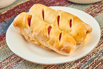 sausages baked in pastry in a fast food cafe close up