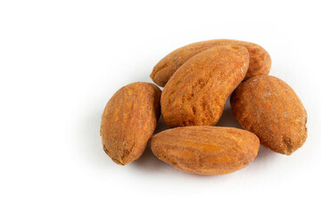A pile of Almonds, isolated on a white background.