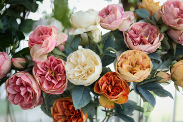 Closeup image of beautiful flowers wall background with amazing colorful roses. Top view