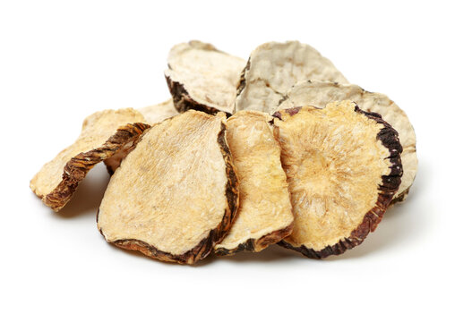 Peruvian ginseng or maca Lepidium meyenii, dried root and pow ，slice on a white background