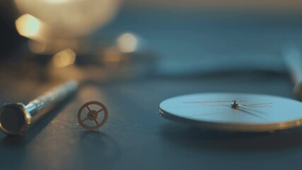 Nice watchmaker's workshop with many parts and gears, disassembled mechanical watch,