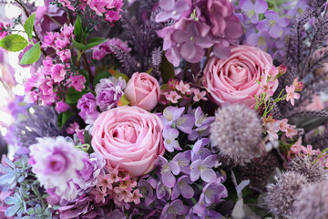 Closeup image of beautiful flowers wall background with amazing colorful roses. Top view