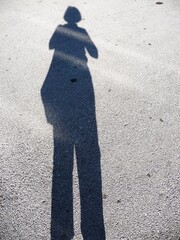 Mein Schatten auf Pflastersteinen.