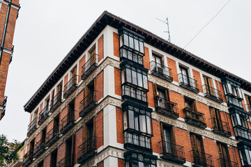 Low angle view of old residential building in Lavapies quarter in Madrid
