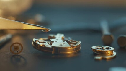 Nice watchmaker's workshop with many parts and gears, disassembled mechanical watch,