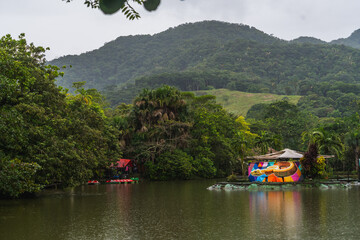 house boat in river lake jungle