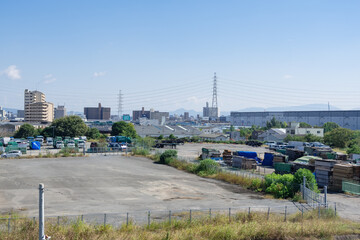 Obraz premium 新木津川大橋から見る資材置き場と住之江市街