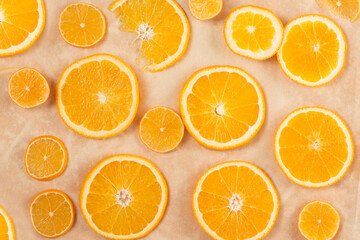 Round orange slices on a light background.