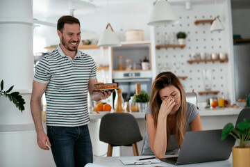 Wife's birthday. Husband surprise his wife with birthday cake..