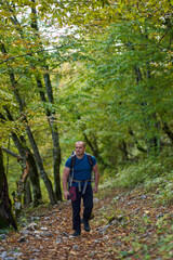 Man hiking into the forest