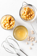 Aquafaba, chickpea water brine draining. Replace egg for vegan recipe