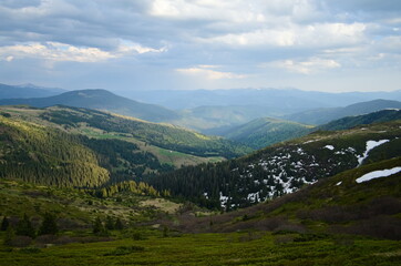 Fototapeta na wymiar Mountain range view during hiking in Carpathian mountains in Ukraine.