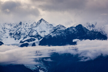 Fototapeta na wymiar Close-up of misty snow mountain scenery